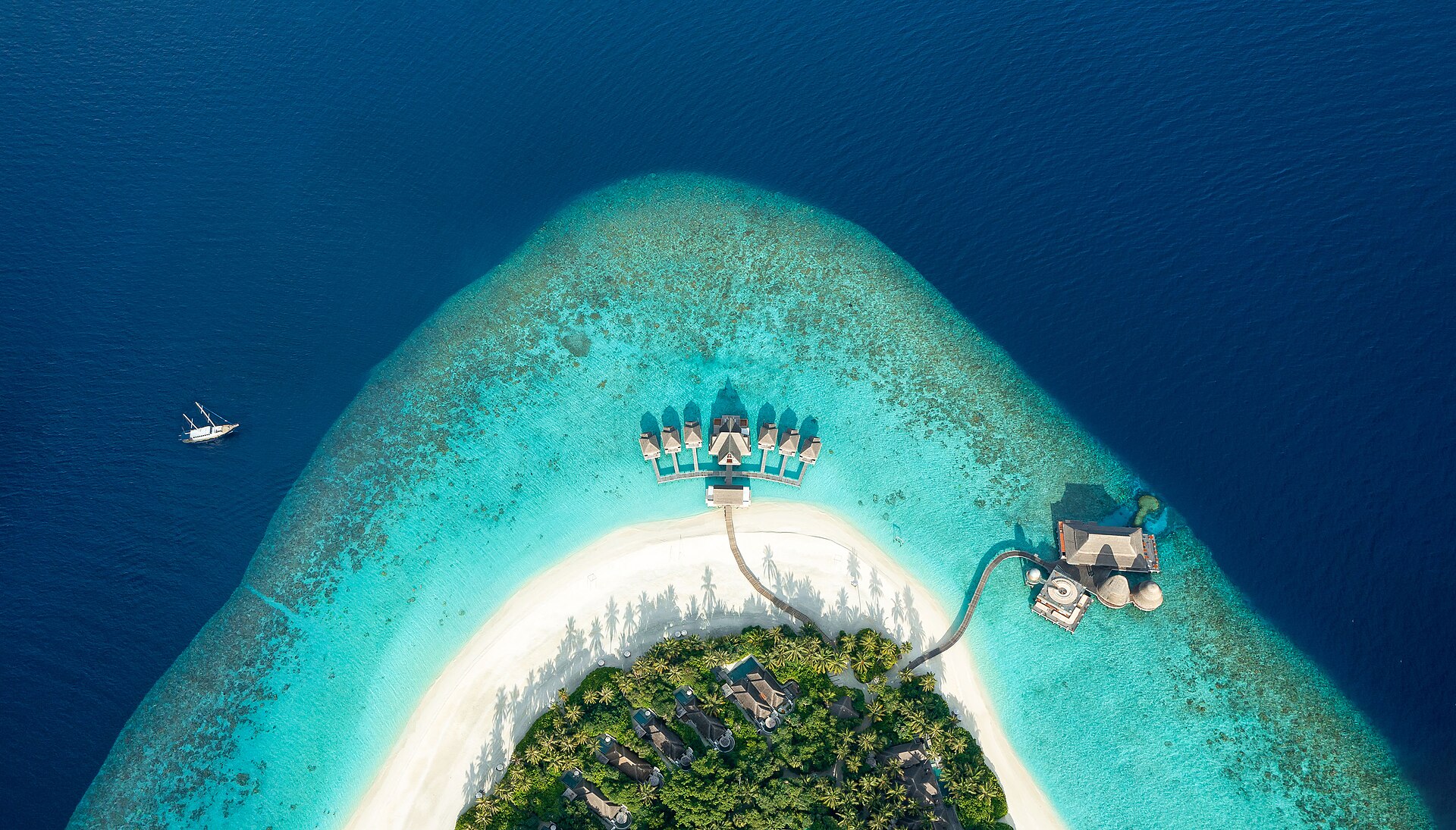 Maldives overwater villa aerial
